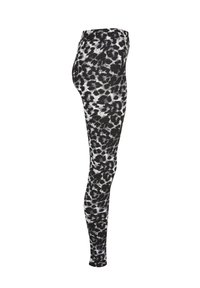 Leggings negre cu un imprimeu leopar pe alb și gri, realizate dintr-un material elastic, cu o talie înaltă și un design ajustat.