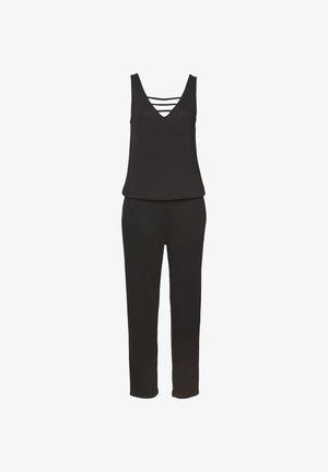 Sort ærmeløs jumpsuit med V-hals og tre vandrette stropper over brystet, med løs top og lige bukser.