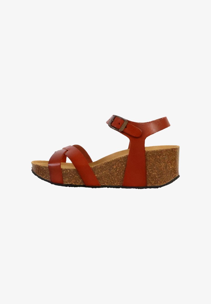 Sandales compensées en cuir rouge avec une semelle intermédiaire en liège et une sangle de cheville réglable, ornées de brides croisées sur les orteils. Semelle texturée pour une meilleure adhérence.