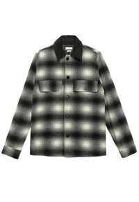 Camicia in flanella a quadri bianco e nero con chiusura a bottoni, due tasche frontali e colletto. Tessuto morbido con un motivo a quadri ben definito.