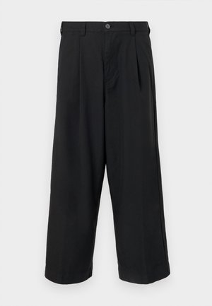 Black wide-leg trousers with a smooth texture, featuring a single button closure, front pleats, and side pockets.