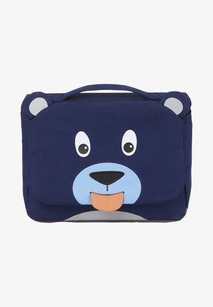 Sac bleu marine avec un motif de visage d'ours. Présente de grands yeux, un museau bleu et une langue orange. Comprend une poignée supérieure et une texture en tissu doux.