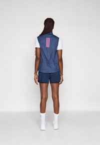 adidas Performance BER25 OTR SHORTS - Sports shorts - collegiate navy