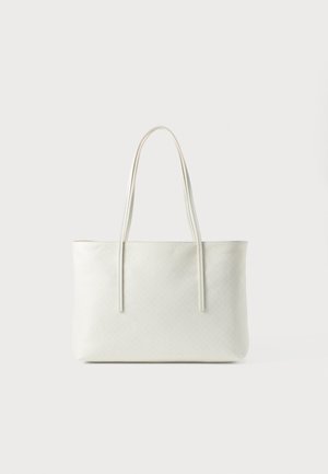 Cream-colored rectangular tote bag with long slim handles and subtle textured pattern on smooth surface.