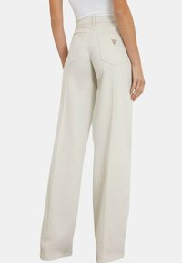 Guess Jeans a zampa - beige