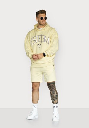 BASIC SWEATSHORTS - Shorts - lightyellow