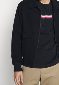 Tommy Hilfiger Triko s potiskem - dark blue