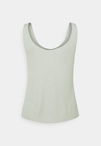 Světlý zelený žebrovaný top bez rukávů s kulatým výstřihem, širokými ramínky a volným střihem, který má jemnou strukturu po celém povrchu.