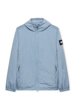 Light blue, lightweight jacket with a hood, front zipper, elastic cuffs, and side pockets. Features a black logo patch on the sleeve.