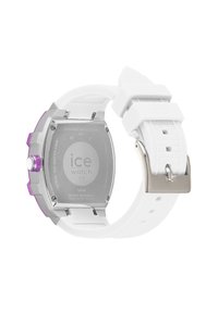 Balts silikona siksniņas pulkstenis ar sudraba nerūsējošā tērauda korpusu, purpura akcentiem un apaļu ciparnīcu, uz kuras redzams "ice watch" logo.