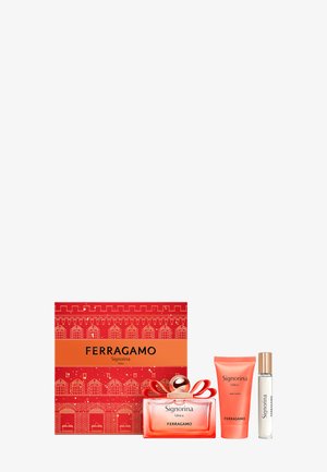 Ferragamo Signorina Unica gift set with perfume bottle, body lotion tube, travel spray, and red decorative box with gold pattern.