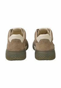 Brown suede sneakers with cream leather accents, featuring a rounded toe and textured rubber sole. Visible heel pull tabs.