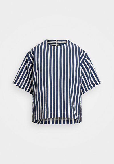 Striped short-sleeve top in navy and white, with a round neckline and a loose fit. The fabric has a slightly textured appearance.
