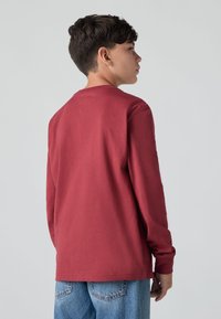 Levi's® SADDLE MAN - Top s dlhým rukávom - red pear
