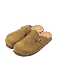 Suede clogs in olive green with a rounded toe, side buckle detail, brown sole, and open back design for easy wear.
