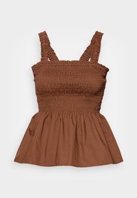 Haut sans manches en coton marron avec un corsage smocké et des bretelles volantées, présentant un ourlet évasé et une texture douce.