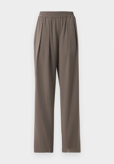 Taupe loose-fit trousers with elastic waistband and front pleats, made from smooth fabric.