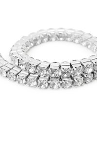 Silver-tone bracelet featuring square crystal stones in a flexible, interconnected design. Smooth metal finish with clear, reflective facets.