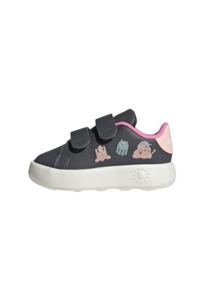 Schwarzer Kindersneaker mit pinkem Futter, zwei Klettverschlüssen, weißer Sohle und Cartoon-Monster-Designs an der Seite.