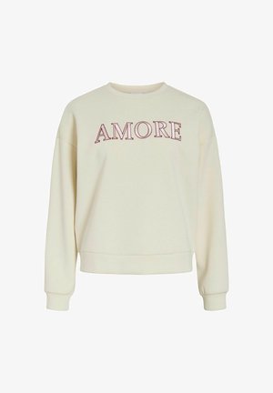 Sweatshirt crème à manches longues, avec poignets et ourlet côtelés. Présente le mot "AMORE" en lettres bordeaux sur la poitrine. Texture douce.