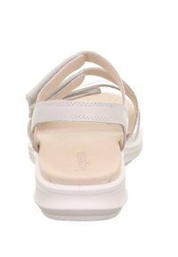 Offene Sandalen mit hellgrauen Stoffriemen und weißer Sohle aus Synthetik. Gepolsterte Innensohle mit eingeprägtem Logodesign.