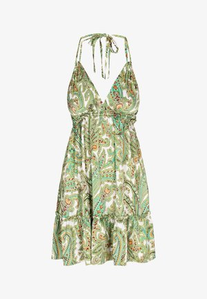 Halterio apkaklės suknelė su giliu V formos iškirpimu, puošta žaliais paisley raštais ant baltos medžiagos ir su volančiu priekšmus. Lengva, gėlių rašto.