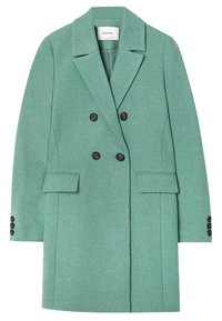 Cappotto doppiopetto verde menta con revers, tasche frontali e bottoni neri sui polsini. Realizzato in tessuto texture.
