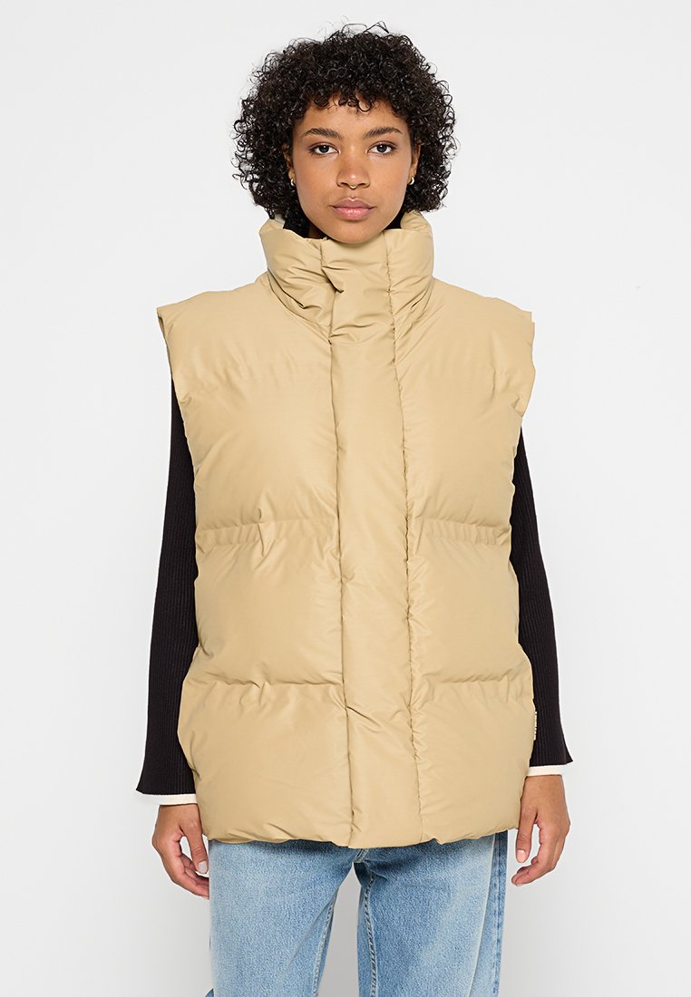 Rains Bodywarmer zandkleur