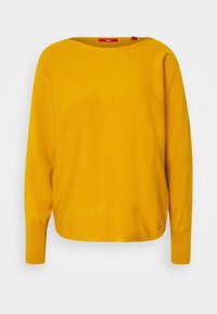 Pull jaune avec col bateau, manches longues et poignets côtelés. Fabriqué en tissu doux, avec un petit logo en bas à gauche.