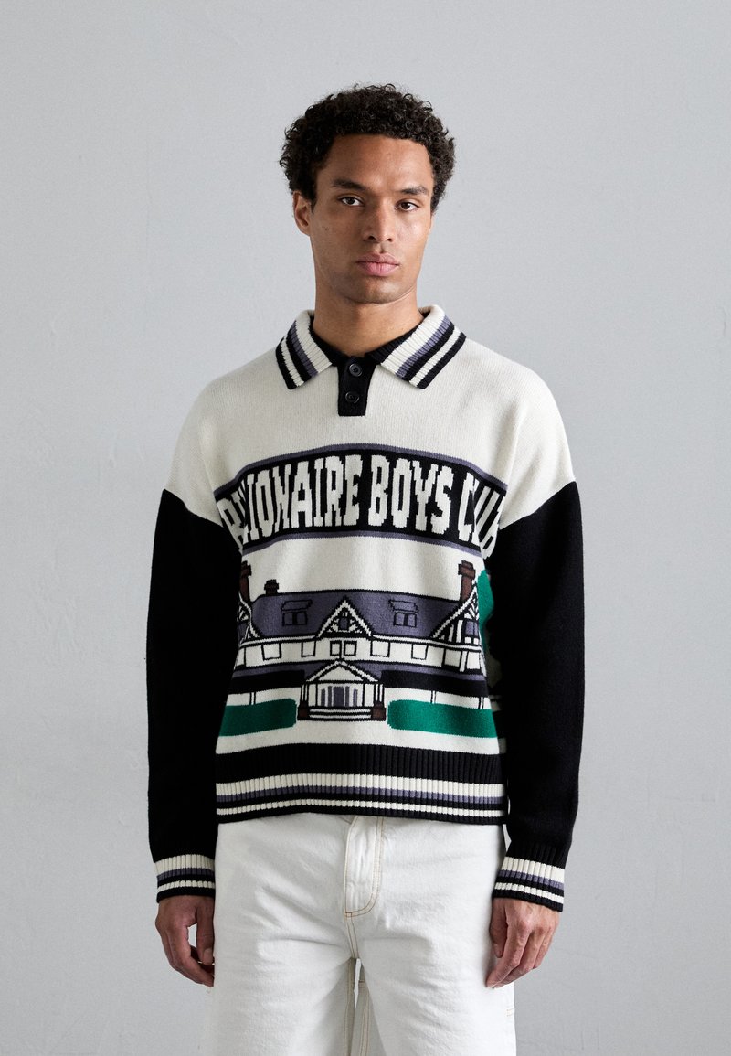 Pull en tricot avec une palette de couleurs crème et noir, des poignets côtelés, et un motif représentant une maison avec le texte "Billionaire Boys Club."