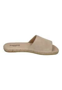 Beige suede slide sandal with a wide upper and woven jute detailing along the sole, featuring a soft texture and minimalist design.