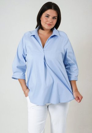 EN ENCOLURE EN V - Blouse - bleu  ciel