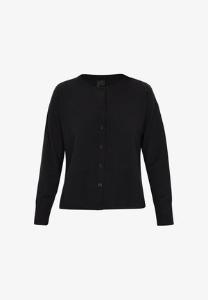 Melnā kardigāna ar apaļu apkakli, garām piedurknēm un pilnu pogu aizdari. Ribotie aproces un apakšmalas piešķir tekstūru. Gluda auduma apdare.