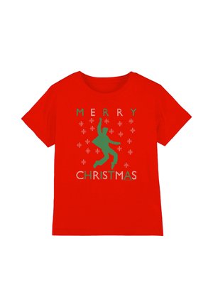 Red T-shirt with green silhouette of a dancing person, surrounded by snowflakes, and "Merry Christmas" text in green and white.