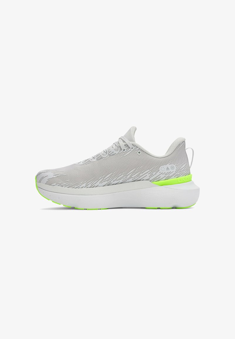 Light gray athletic shoe with a textured upper and neon green accents. Features a thick white sole and lace-up design.