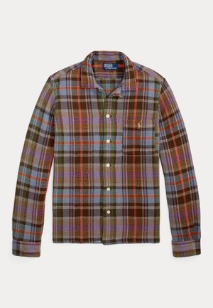 Chemise à manches longues avec boutons, motif à carreaux multicolores en marron, violet, vert et bleu, avec un petit logo brodé sur la poche poitrine.