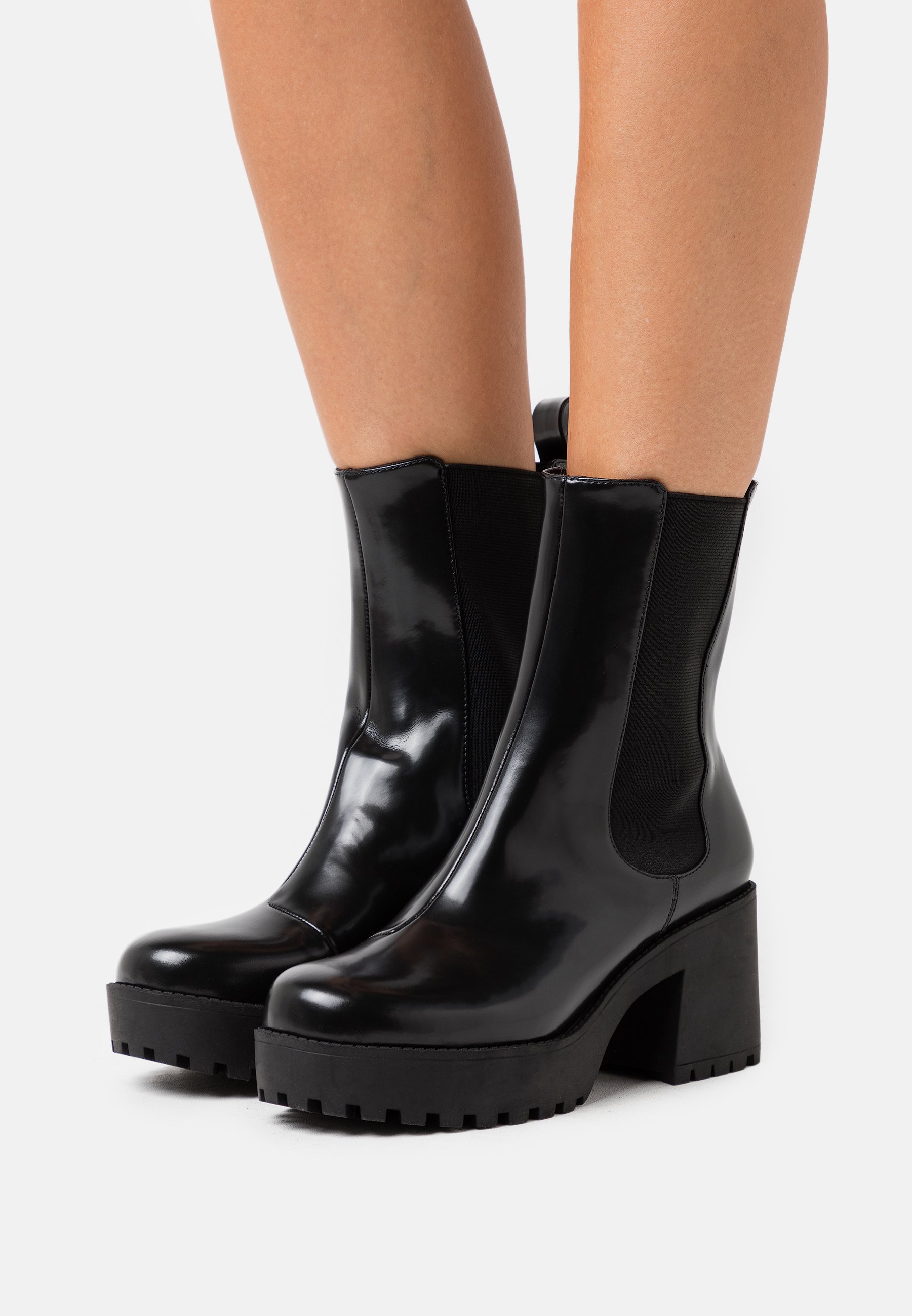 monki patent boots