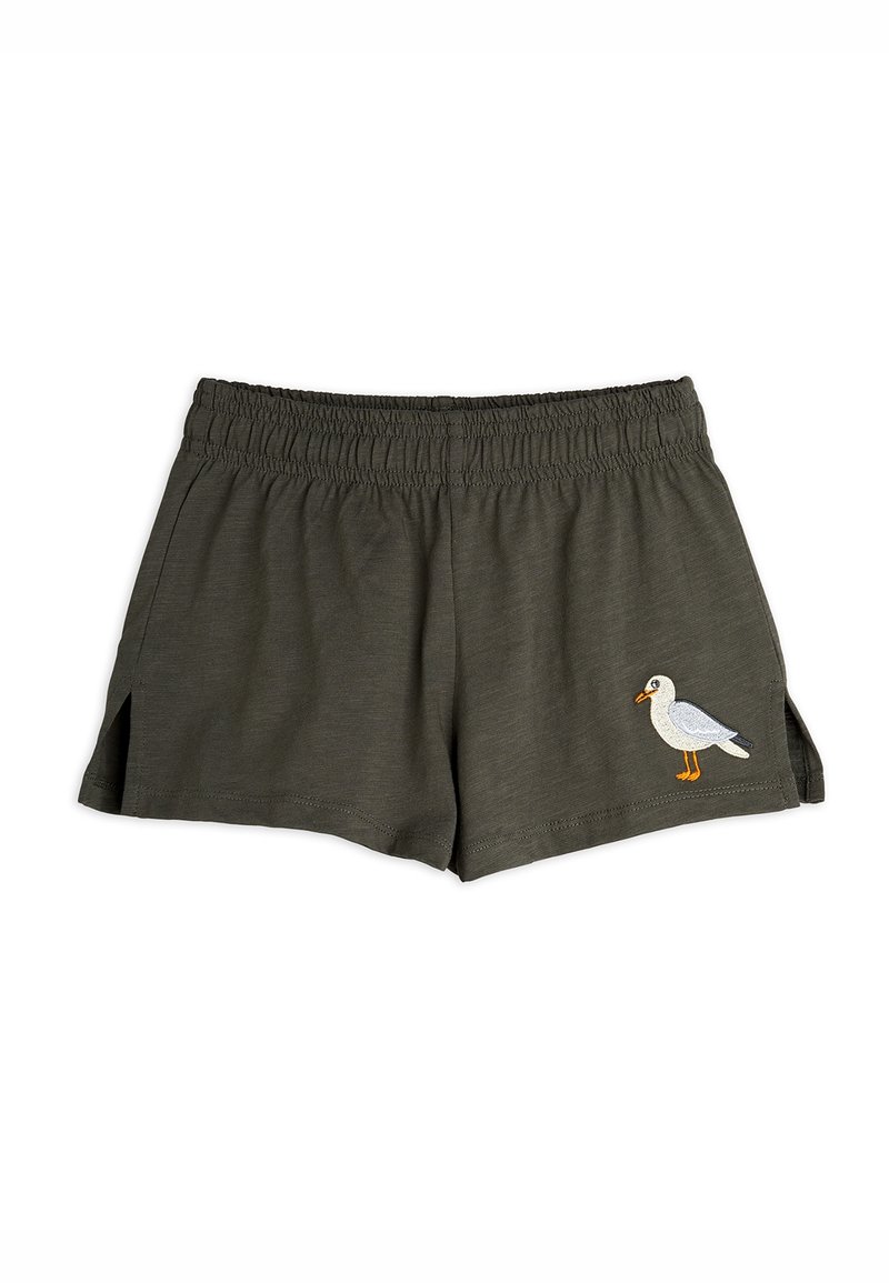 Shorts taille élastique vert foncé avec petites fentes latérales et une mouette blanche brodée sur la jambe avant droite.