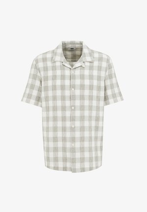 Rövid ujjú gombos ing világosszürke és fehér kockás mintában. Texturált anyagból készült, klasszikus gallérral és öt gombbal.