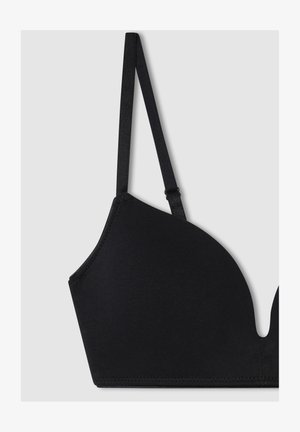 Brassiere nero senza fili realizzato in tessuto morbido, con superficie liscia, spalline regolabili e scollatura profonda. Nessuna ferramenta visibile.