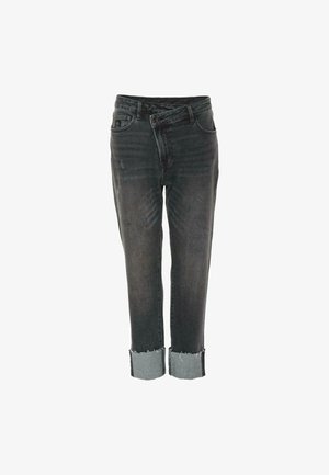 Zwarte denim jeans met een versleten afwerking, omgeslagen zoom en een patchworkdetail bij de enkel. Voorzien van een standaard vijf-pocket ontwerp.