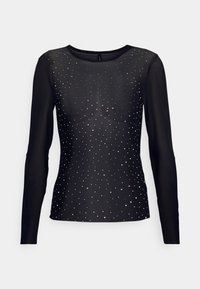 Haut à manches longues noir en tissu transparent, orné de strass éparpillés de différentes couleurs et tailles, avec un col rond.