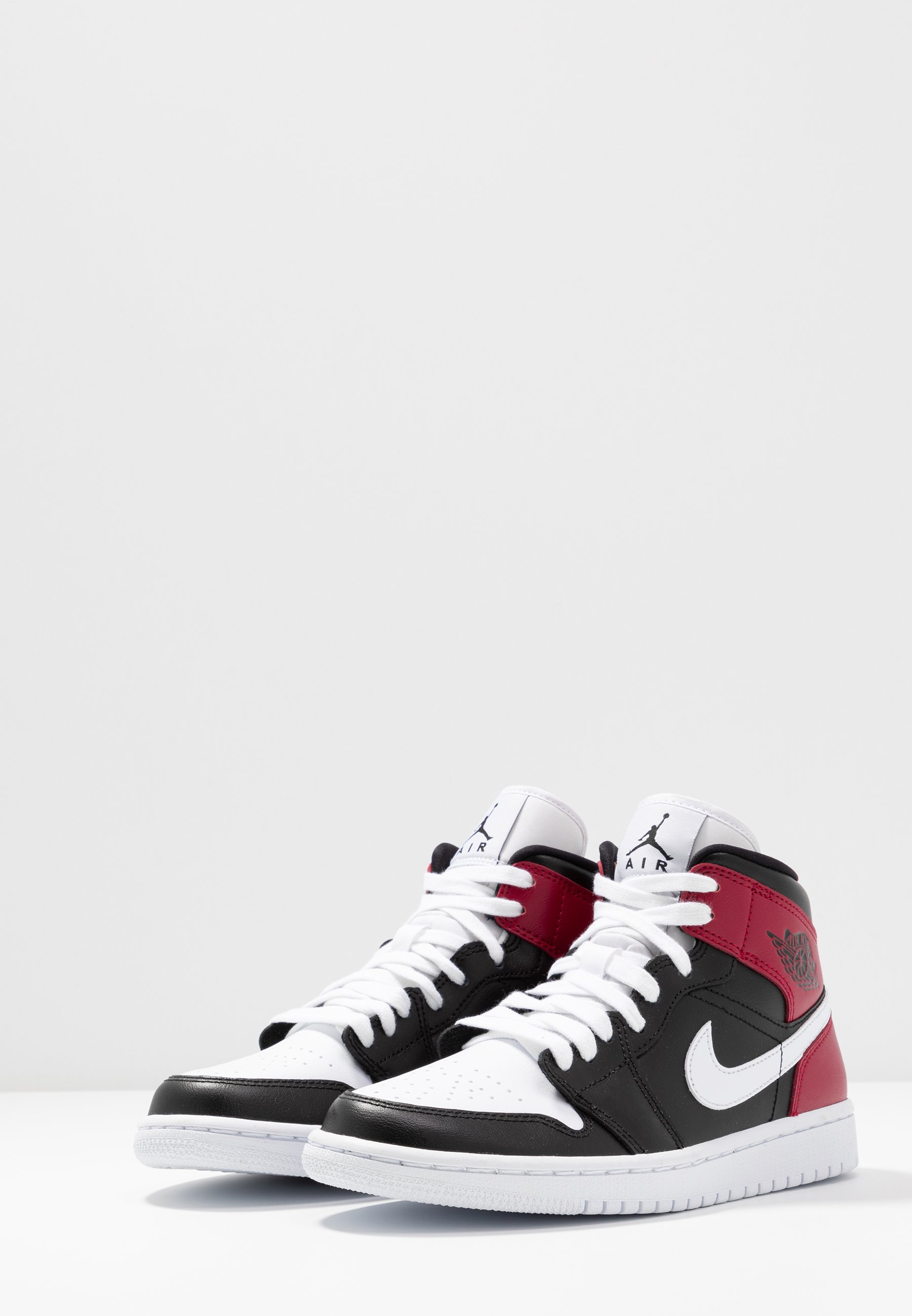 jordan 1 mid black noble red