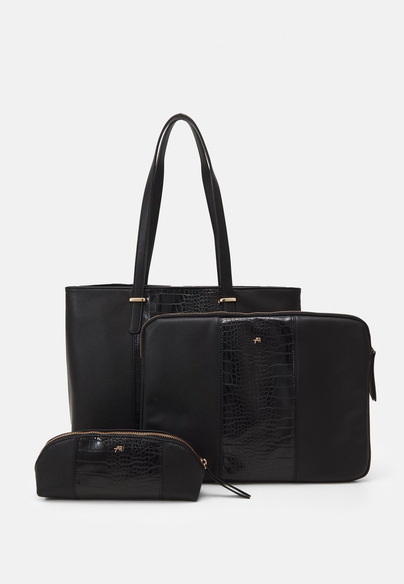 Set de genți negre care include o geantă mare tip tote, o husă pentru laptop și un plic mic. Texturi netede și cu efect de crocodil, accentuate cu detalii aurii.