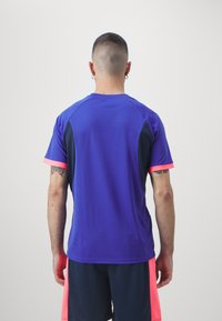 Puma INDIVIDUALLIGA - Sporta krekli - bluemazing