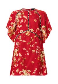 Robe rouge à fleurs avec manches amples, ornée de bordures noires et d’une fermeture bouton œillet dans le dos au niveau de l’encolure.