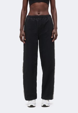 Champion, SPORTSWEAR OPEN HEM PANTS STANDARD FIT - Долнище на анцуг - black