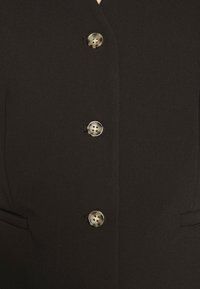 DESIGNERS REMIX Väst - black