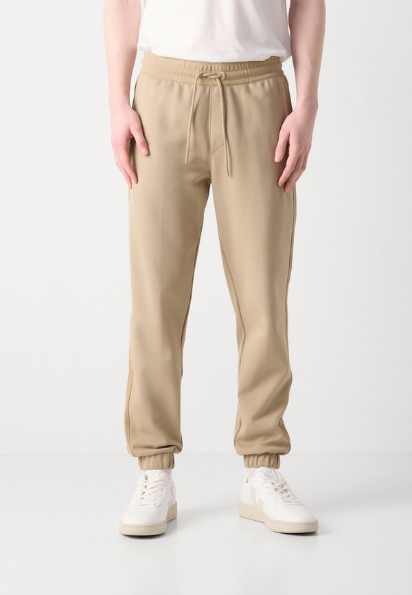 LOGO TAPE SWEATPANT - Tracksuit bottoms - tree house2