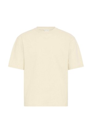 Lichtbeige T-shirt met korte mouwen en een ronde hals. Zachte katoenen stof, losse pasvorm en een eenvoudig ontwerp zonder zichtbare patronen of accenten.